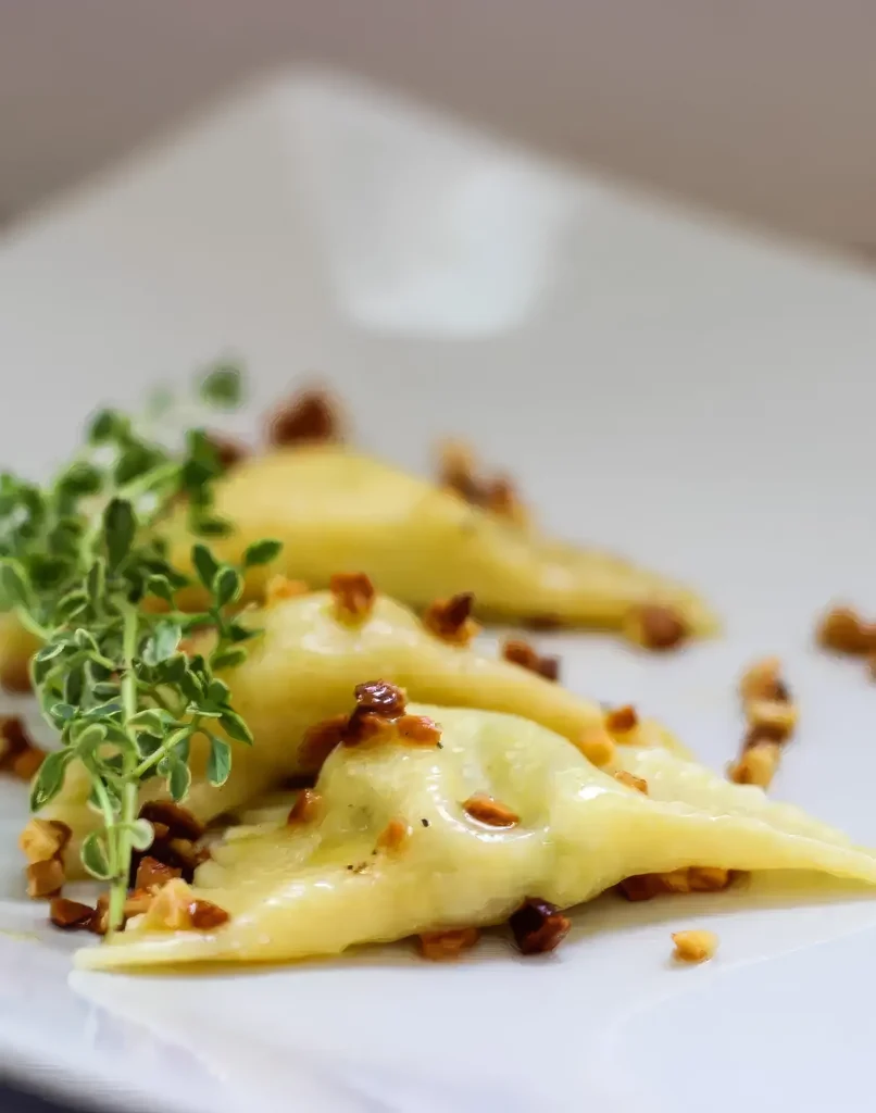 Ricetta Ravioli di Caprino e Porro